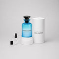 Louis Vuitton Afternoon Swim Sample Spray features a blue glass bottle and a small spray vial, presented in a white box.
