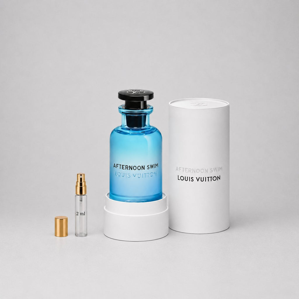 Louis Vuitton Afternoon Swim Sample Spray features a blue bottle with a black cap, alongside a 2 ml spray vial and a white bo