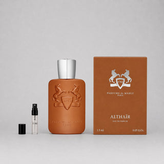 Parfums de Marly Althaïr Sample Spray featuring a brown bottle, a small spray vial, and a matching box.