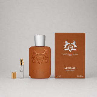 Parfums de Marly Althaïr sample spray, featuring a brown bottle, 2ml spray vial, and elegant packaging.