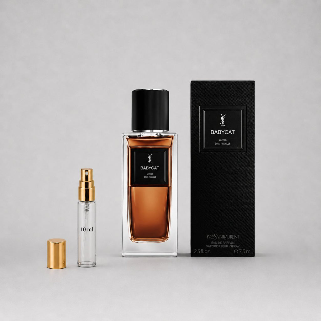 Yves Saint Laurent Babycat Sample Spray with a 75ml bottle and a 10ml travel spray, displayed with a black box.