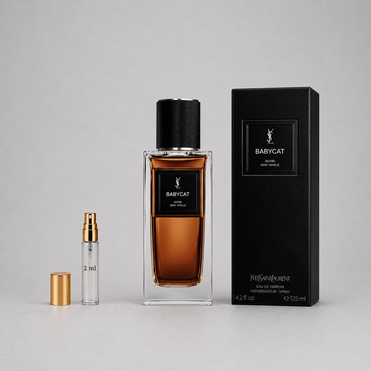 Yves Saint Laurent Babycat Sample Spray includes a 2ml spray vial and a 125ml bottle in a sleek black box.