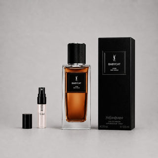 Yves Saint Laurent Babycat Sample Spray includes a 4.2 oz perfume bottle and a 0.5 oz travel spray in a sleek box.