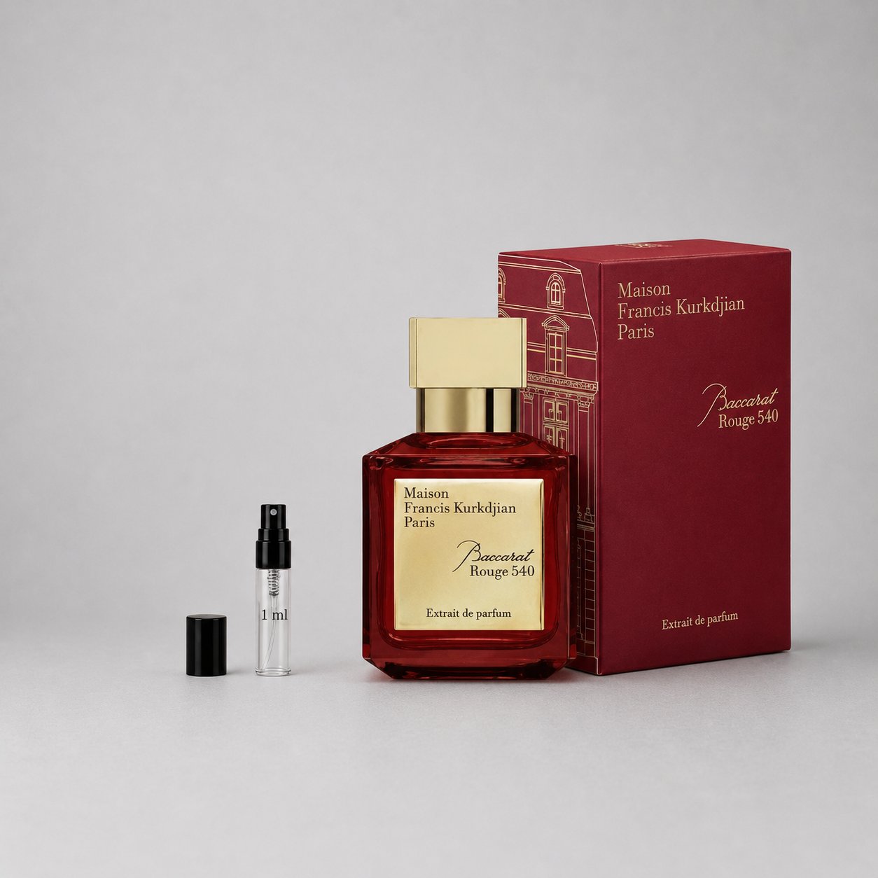 Maison Francis Kurkdjian Baccarat Rouge 540 sample spray with a red box and a clear vial, showcasing the luxurious fragrance.