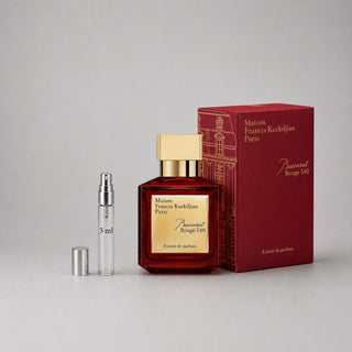 Maison Francis Kurkdjian Baccarat Rouge 540 sample spray with a 3ml vial beside a red box featuring gold accents.