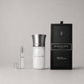 Blanche Bête Sample Spray by Liquides Imaginaires, featuring a sleek silver cap and a decorative box.