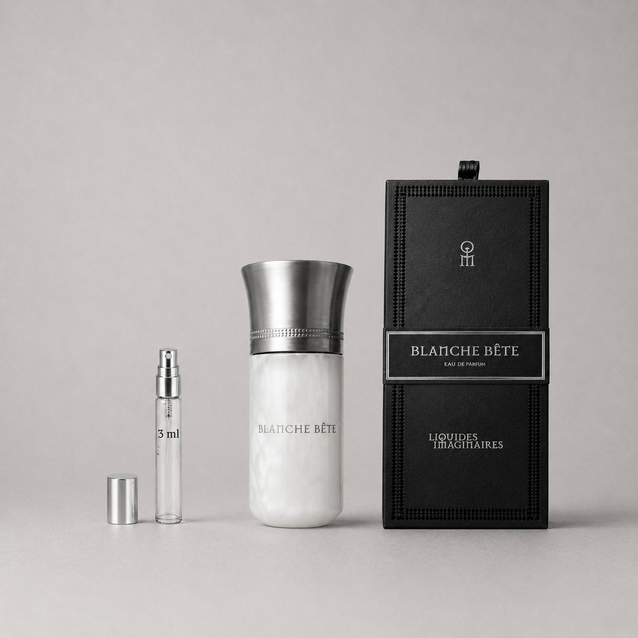 Blanche Bête Sample Spray by Liquides Imaginaires, featuring a sleek silver cap and a decorative box.