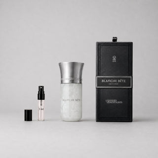 Blanche Bête Sample Spray by Liquides Imaginaires, featuring a sleek bottle and elegant packaging, displayed on a neutral bac
