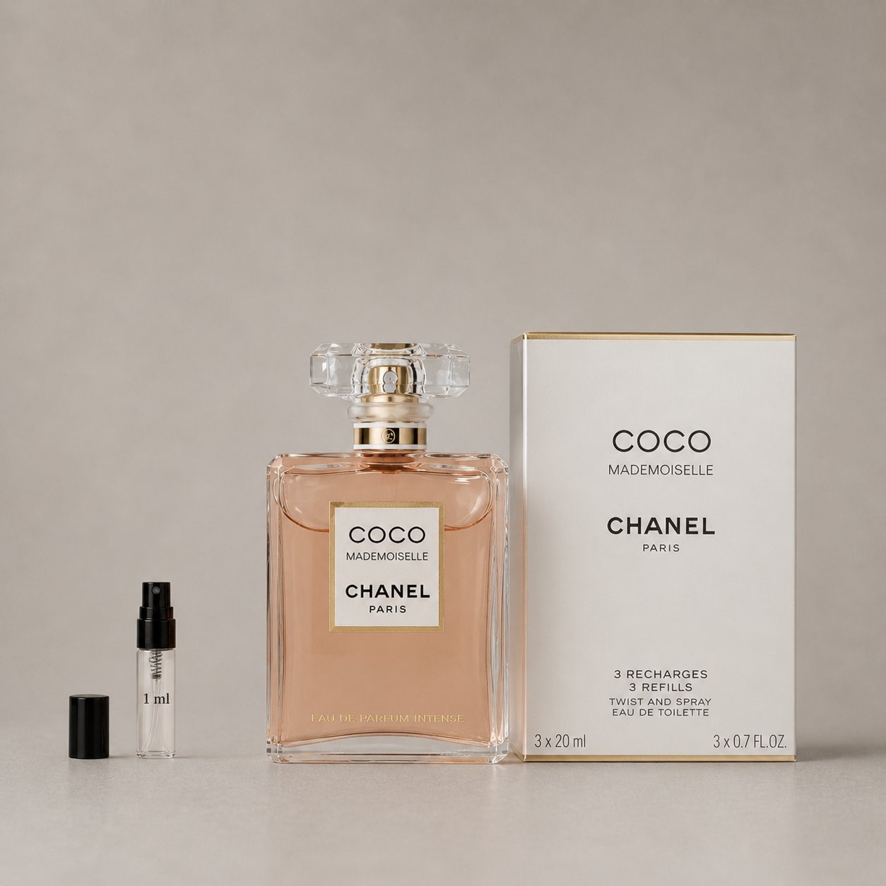 Chanel Coco Mademoiselle Sample Spray set featuring a 20ml bottle and three 1ml refill vials in elegant packaging.