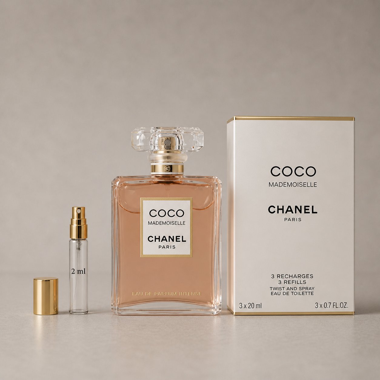 Chanel Coco Mademoiselle Sample Spray set with a 20ml bottle, a 2ml travel spray, and a box for refills.