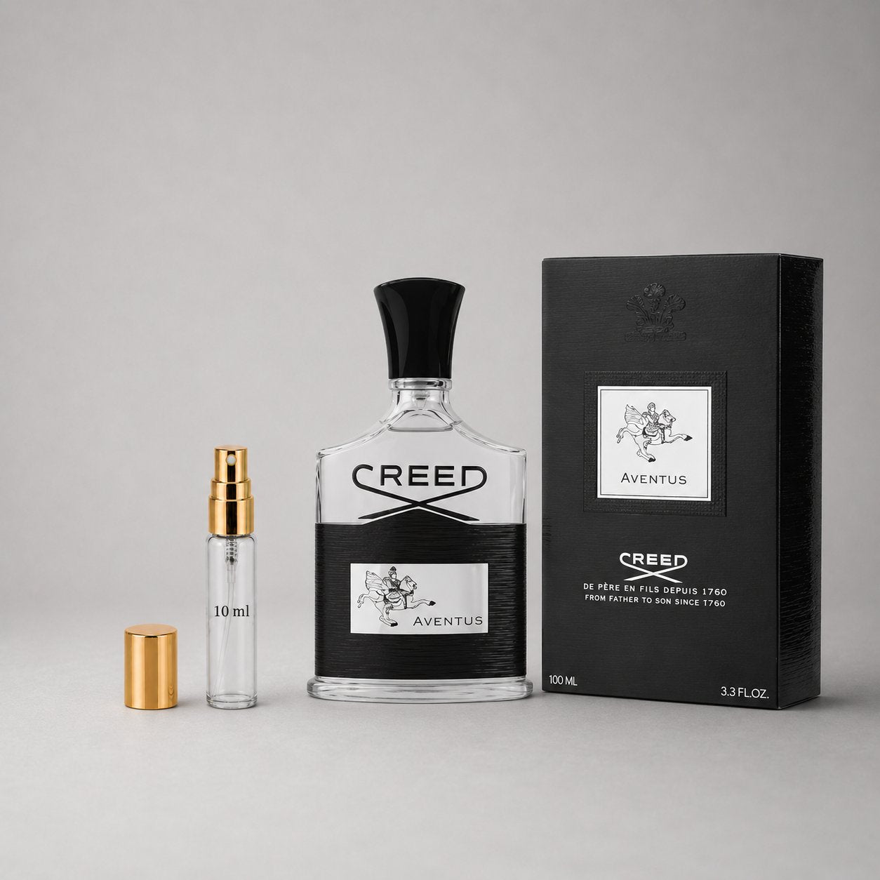 Creed Aventus Sample Spray featuring a clear bottle, gold cap, and elegant packaging, showcasing luxury fragrance.