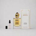 Maison Mataha Escapade Gourmande Sample Spray features a 100ml perfume bottle with a gold cap and a 1ml travel spray.