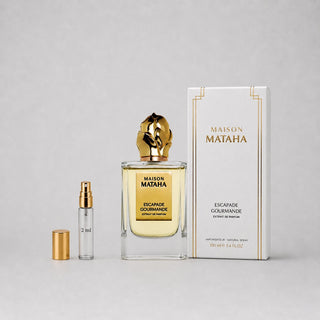 Maison Mataha — Escapade Gourmande Sample Spray featuring a 100 ml bottle and a 2 ml travel spray, elegantly presented in a b