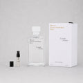 Maison Francis Kurkdjian Gentle Fluidity Silver Sample Spray, featuring a clear bottle, 1ml sample, and elegant packaging.