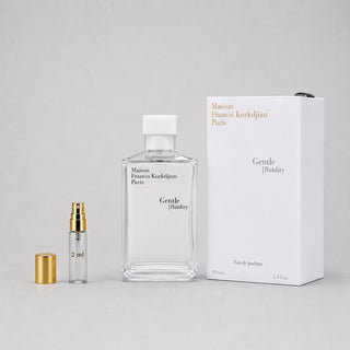 Maison Francis Kurkdjian Gentle Fluidity Silver Sample Spray with a 2ml vial and elegant packaging on a gray background.