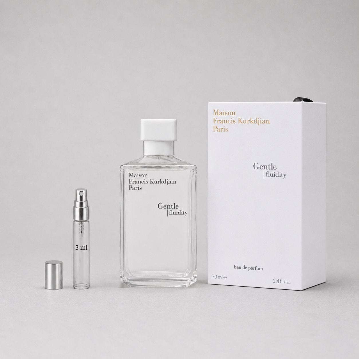 Maison Francis Kurkdjian Gentle Fluidity Silver Sample Spray, 3ml vial, 70ml bottle, and elegant packaging displayed together