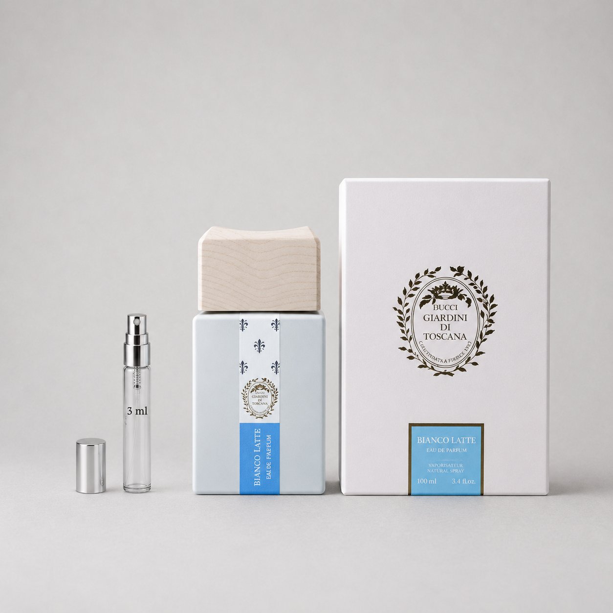 Giardini di Toscana Bianco Latte Sample Spray, featuring a sleek bottle, wooden cap, and elegant packaging.