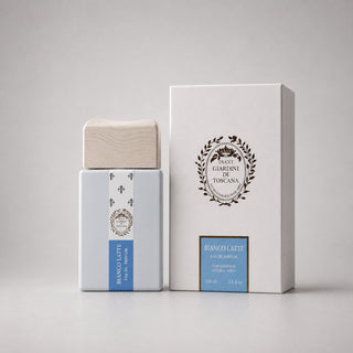 Giardini di Toscana Bianco Latte Sample Spray in a sleek bottle with a wooden cap, accompanied by a stylish box.