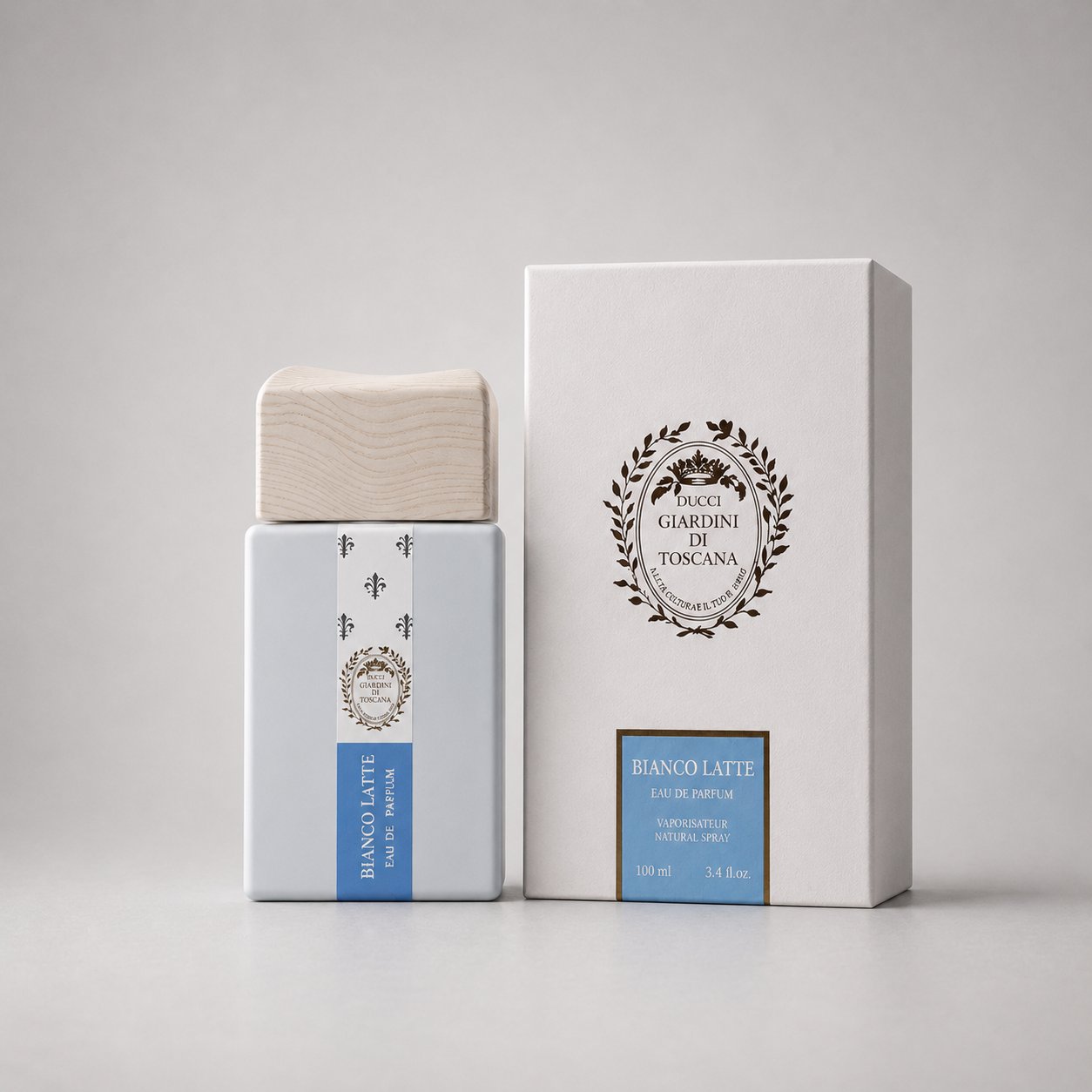 Giardini di Toscana Bianco Latte Sample Spray in a sleek bottle with a wooden cap, accompanied by a stylish box.