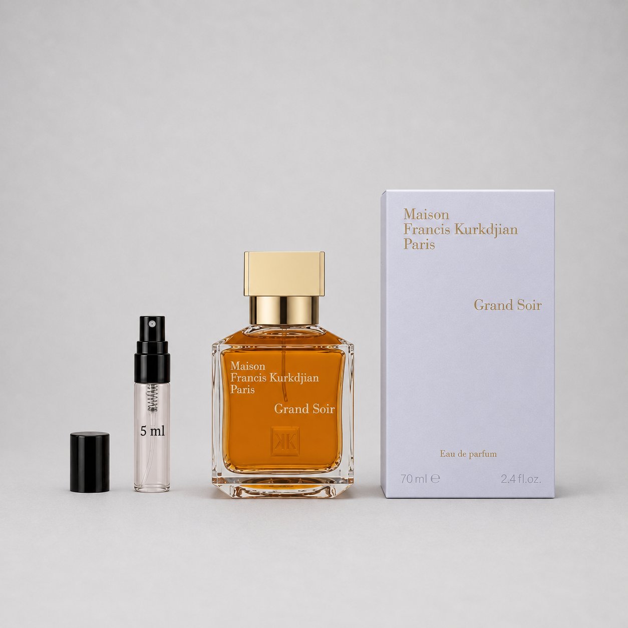 Maison Francis Kurkdjian Grand Soir Sample Spray with a 70ml bottle and a 5ml travel spray, presented with a box.