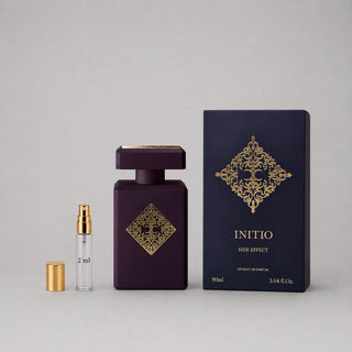 Initio Parfums Privés Side Effect Sample Spray featuring a dark purple bottle, gold accents, and a navy box.