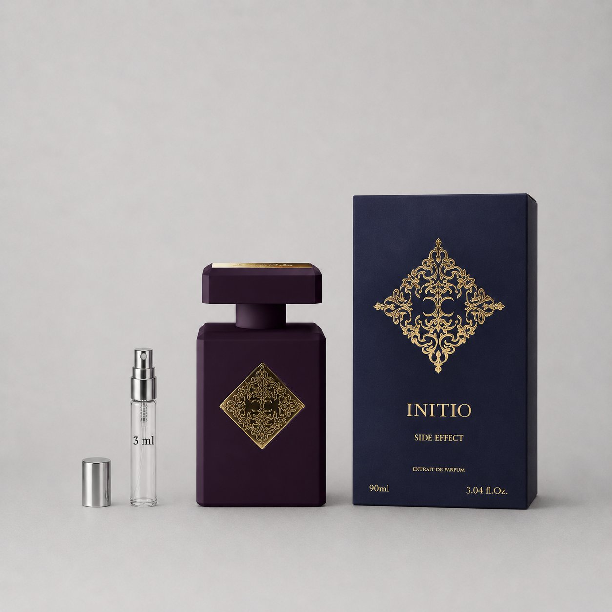 Initio Parfums Privés Side Effect Sample Spray includes a 90ml bottle with a dark purple design and a 5ml spray vial.