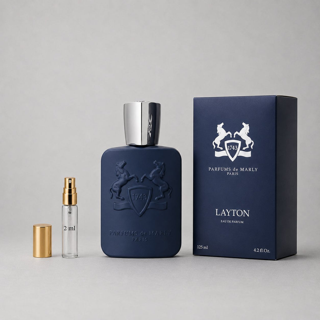 Parfums de Marly Layton Sample Spray, featuring a navy blue bottle, silver cap, and elegant packaging.