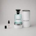 Louis Vuitton Imagination Sample Spray featuring a clear bottle with a black cap and a white cylindrical box.