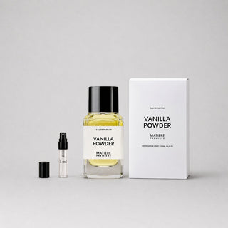Matiere Premiere Vanilla Powder Sample Spray with a full-sized bottle and a travel-sized vial in a minimalist box.
