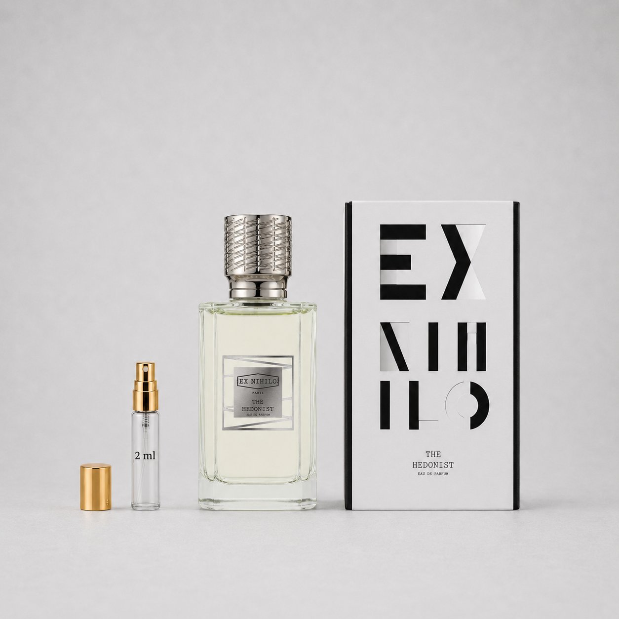 Ex Nihilo The Hedonist Sample Spray includes a 100ml bottle and a 2ml travel spray, elegantly packaged in a sleek box.