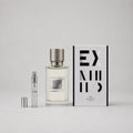 Ex Nihilo The Hedonist Sample Spray featuring a clear bottle with a textured silver cap, a 3ml spray vial, and a sleek box.