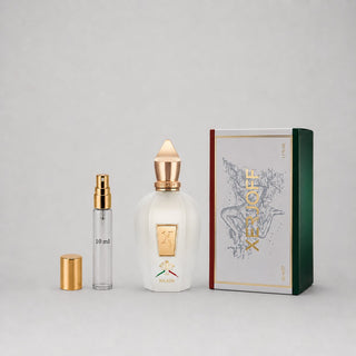 Xerjoff Naxos Sample Spray with a clear bottle, gold accents, and a green box, featuring a 10 ml spray vial.