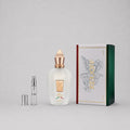 Xerjoff Naxos Sample Spray, 3 ml vial beside a decorative box featuring elegant design and branding.