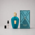 Xerjoff Erba Pura Sample Spray featuring a teal bottle with gold accents and a matching box, alongside a 1ml spray vial.