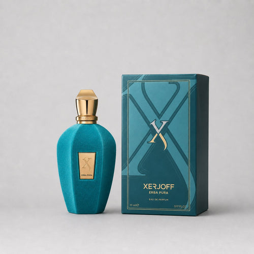 Xerjoff Erba Pura Sample Spray features a teal bottle with a gold cap beside a matching box, showcasing luxury fragrance desi