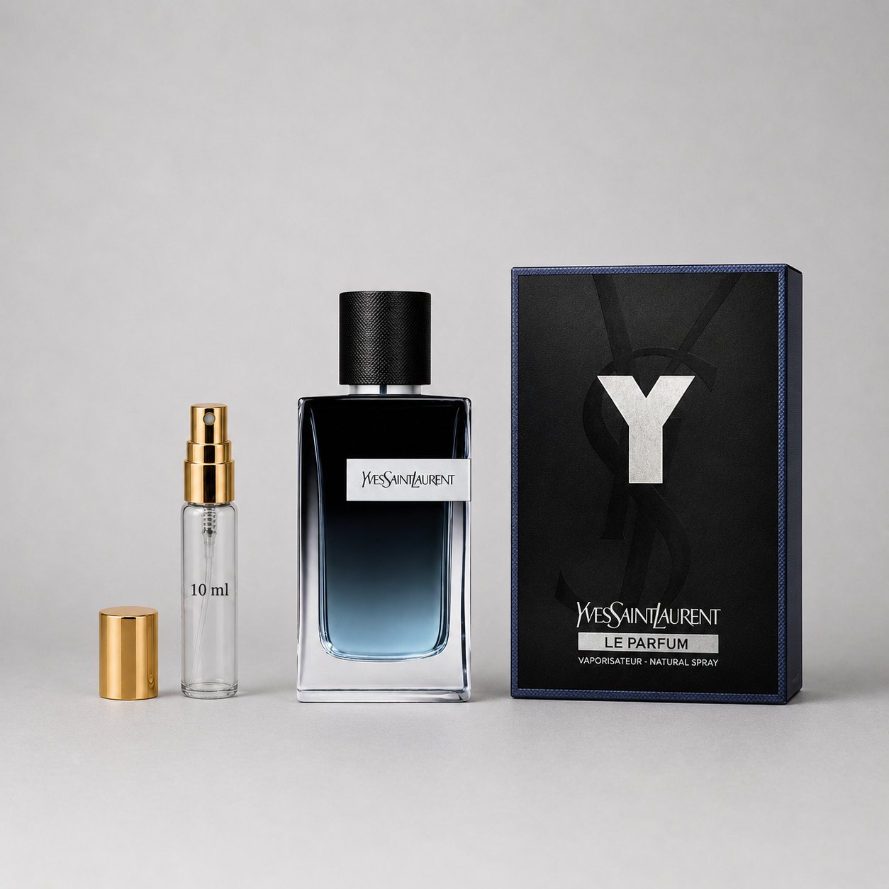Yves Saint Laurent Y Le Parfum Sample Spray featuring a sleek bottle, gold cap, and elegant packaging.